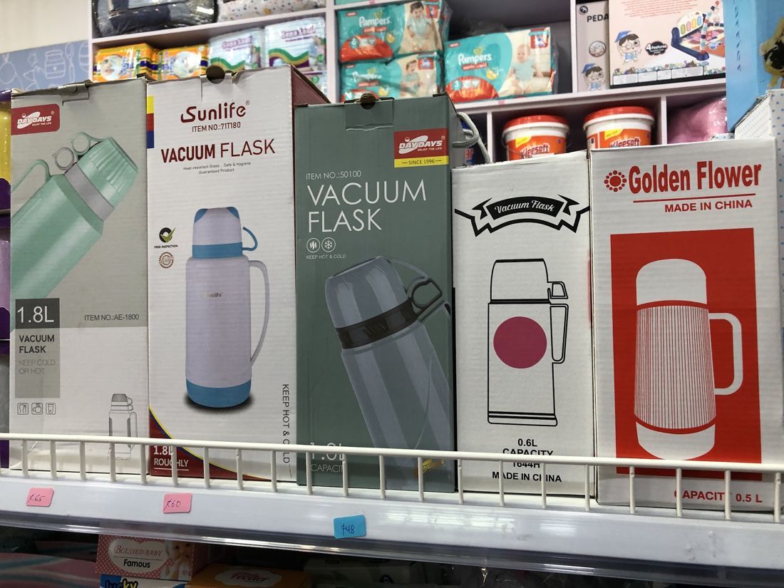 Vacuum flasks on a shelf