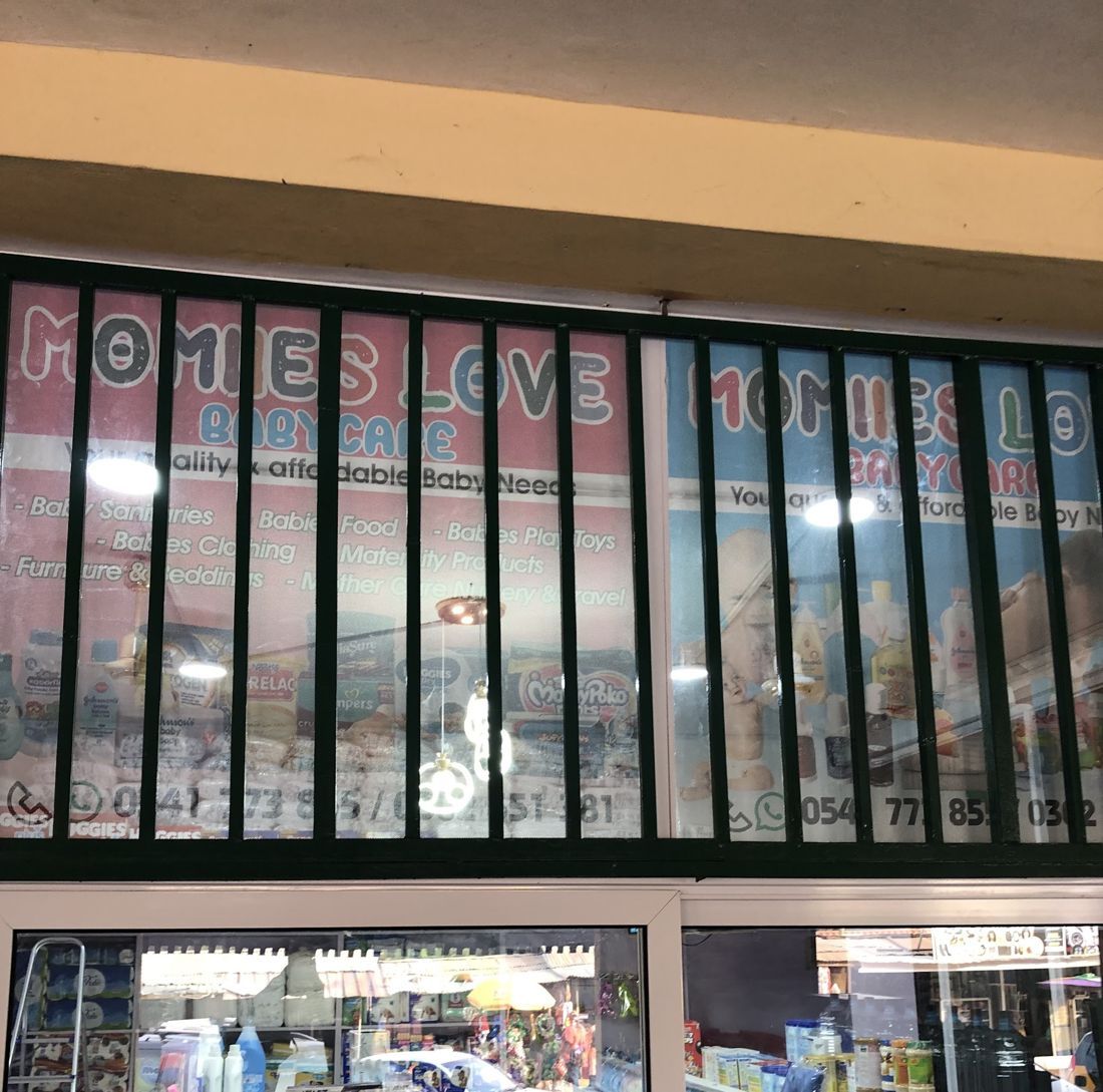 The Momiies Love Babycare shop window sign